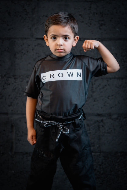CHECKMAT KIDS -Rashguard Black Rank – Made for Champions