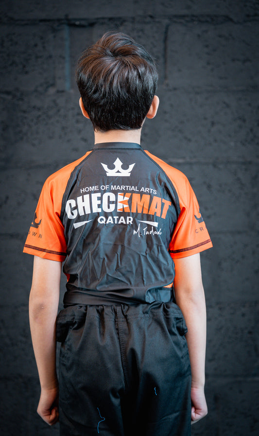 CHECKMAT KIDS -Rashguard orange Rank – Made for Champions